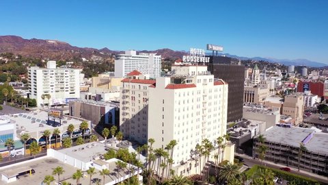LOS ANGELES, CALIFORNIA - CIRCA 2020 - Aerial approach Hotel Roosevelt on Hollywood Boulevard in downtown Hollywood California.