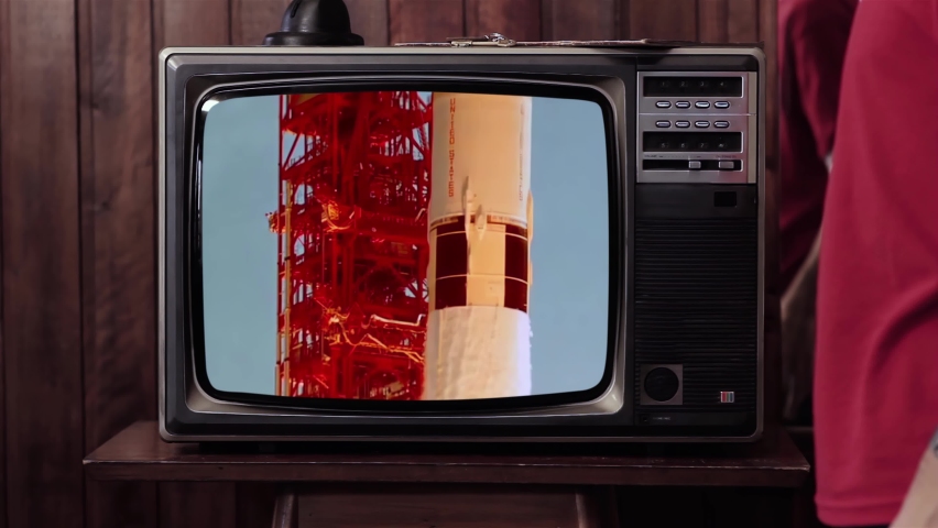 Apollo 11 Launch on a Retro Television. Elements of this video furnished by NASA. 4K Resolution.  Royalty-Free Stock Footage #1063212850