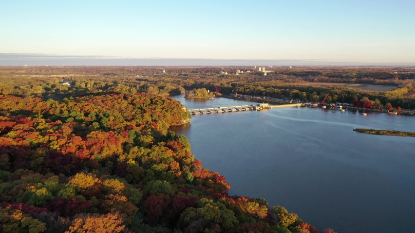 Push in aerial over the beautiful autumn bluffs of the Illinois river banks.