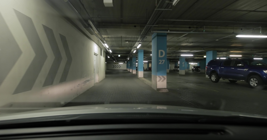 Underground parking lot, empty, lots of emty spot for parking space | Shutterstock HD Video #1063233958