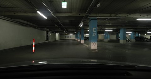Underground parking lot, empty, lots of emty spot for parking space