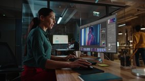 Middle Aged Multiethnic Specialist Working on Desktop Computer in Creative Office Environment. Beautiful Diverse Female is Editing a Fashion Photograph with Model in Digital Graphics Editing Software. - Powered by Shutterstock - Get 15% off with code: PIKWIZARD15