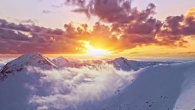 Flying Through Clouds Above Mountain Tops Paradise Heaven Eternity Creation Mountain Range Winter Snow Cold Sunset Sunrise Golden Hour High Peaks Wonderful Inspiring Natural Landscape 4K - Powered by Shutterstock - Get 15% off with code: PIKWIZARD15