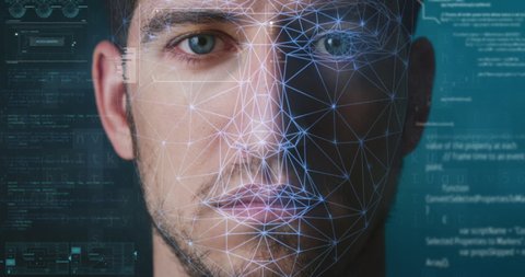 Futuristic sophisticated innovative technology scanning with augmented reality holograms of an young man for facial recognition to ensure personal safety. 