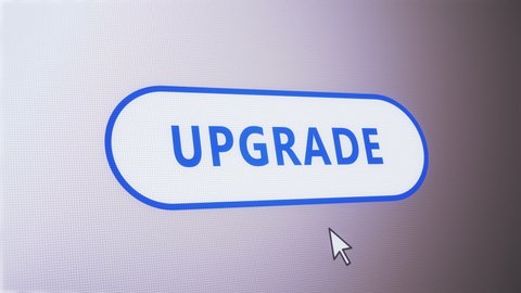 Upgrade button pressed on computer screen by cursor pointer mouse.Concept of improve,repair,fix,update,install,evolution,develpoment of software or webpage.