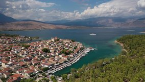Aerial drone video from famous and picturesque port of traditional historic village of Galaxidi, Fokida, Greece