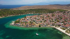 Aerial drone video from famous and picturesque port of traditional historic village of Galaxidi, Fokida, Greece
