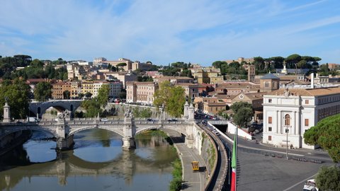 City of Rome cityscape in Italy, traffic Ponte Vittorio Emanuele II bridge on Tiber river