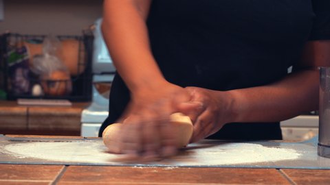 Hands seen kneading fresh dough to make homemade, whole grain pasta