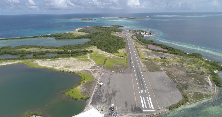 Aerial Shot Aerial Pullback Gran Roque Island airstrip los roques venezuela , Big panorama Amazing Tropical Island