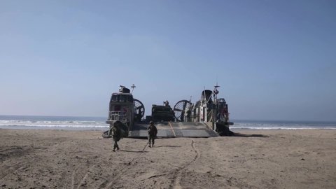 CIRCA 2020 U.S. Marines 1st Combat Engineer Battalion amphibious landing exercise on a beach at Camp Pendleton, CA.