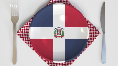 Plate with flag of the Dominican Republic on the table, national cuisine conceptual 3d animation