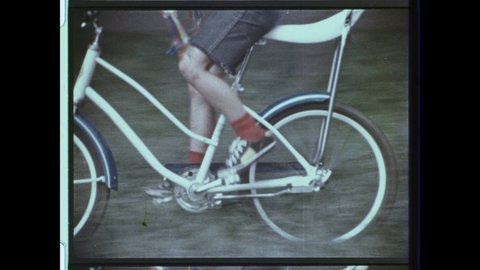 1970s Waltham, MA. Kids Ride Banana Seat Schwinn Bikes in this vintage KEDS Shoes TV AD. 4K Overscan of 16mm Film from Archival Television Commercial Advertisement
