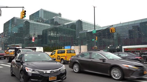 New York city , New York , United States - 01 13 2020: Crossroad in front of the Javits Convention Center during the NRF 2020 Vision in Manhattan, New York. Yellow cab and cars crossing the traffic