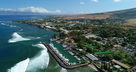 4k forward tracking aerial drone view over the boat harbor in the city of Lahaina,Maui,Hawaii,USA