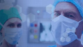 Digital animation of multiple hexagonal shapes over grid lines against male and female surgeon wearing face mask at hospital. medicine research science and global networking concept - Powered by Shutterstock - Get 15% off with code: PIKWIZARD15