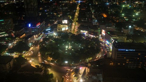 Cebu City, Philippines - June 8: Time lapse view of night traffic around Fuente Osmena Circle in the heart of uptown Cebu City, Central Visayas, Philippines. 