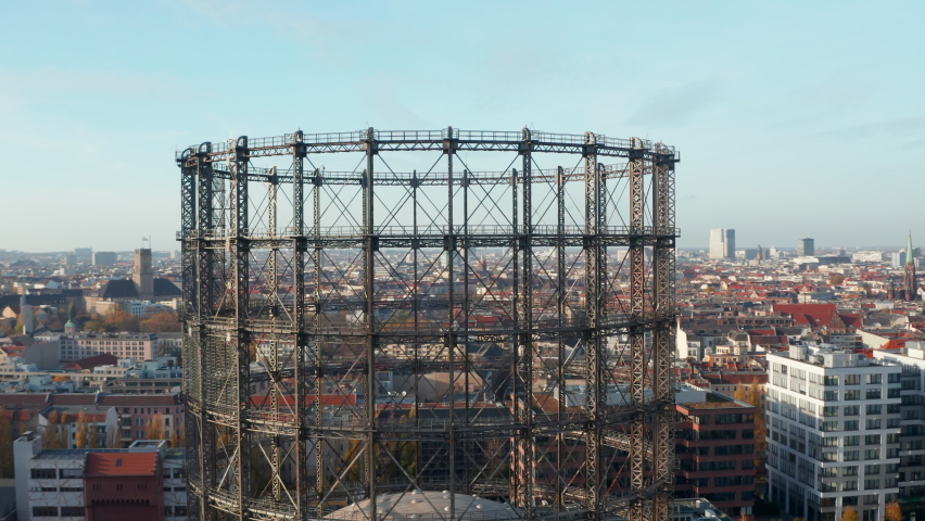 Famous metal structure in Berlin, Germany Gasometer or Gas holder in Schoneberg, Aerial Wide View Royalty-Free Stock Footage #1063315267