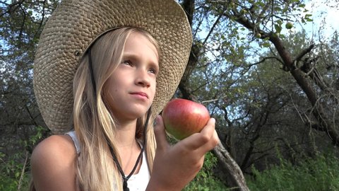 Child Eating Apple, Kid in Orchard, Kid Tasting Fruits in Tree, Farmer Blonde Girl at Village at Countryside