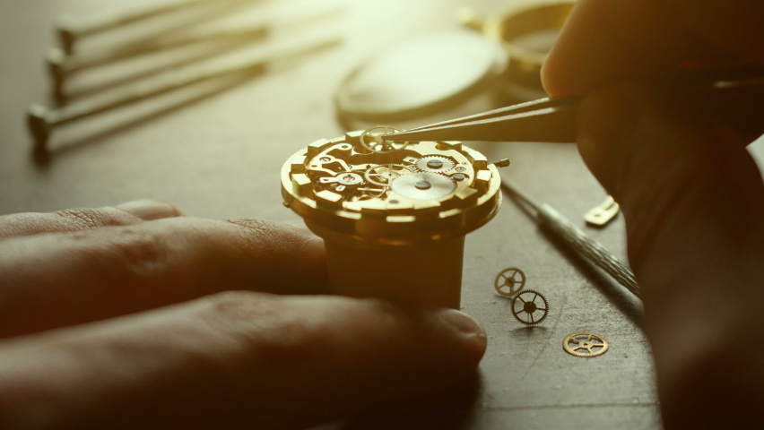Mechanical watch repair with special tools, watchmaker's workshop | Shutterstock HD Video #1063329766