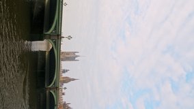 Vertical video of River Thames and Westminster Bridge in London in Coronavirus Covid-19 lockdown, showing quiet, empty iconic famous building and tourist attraction in England, UK