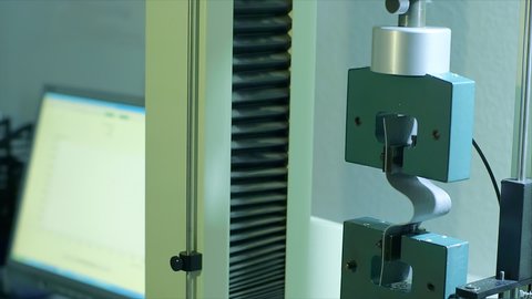 Tensile strength flexible cellular polymeric materials in a laboratory. Video de stock