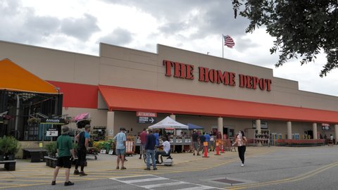 Fort Lauderdale , Florida , United States - 04 06 2020: People waiting in line to enter The Home Depot during corona outbreak crisis.