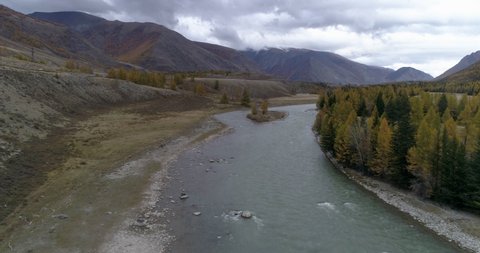Aerial view from drone fliying above of Chuya mountain river in Altai Republic, Russia