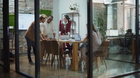 In the Stylish Modern Office Meeting Room: Diverse Group of Business Growth Marketing Professionals Use Computers, Discuss Project Ideas, Brainstorm Startup Company Strategy, Design Creative Product - Powered by Shutterstock - Get 15% off with code: PIKWIZARD15