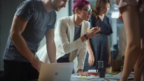 Diverse Multi-Ethnic Team of Professional Businesspeople Meeting in the Modern Office Conference Room. Creative Team Around Table Discuss Data Analysis, Plan Marketing Compain, Social Media Strategy - Powered by Shutterstock - Get 15% off with code: PIKWIZARD15