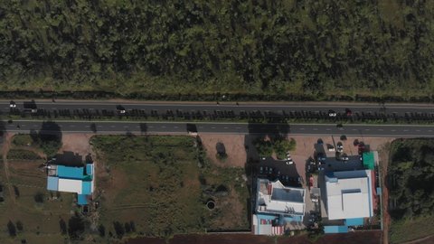 Top down view of highway in India at midday with traffic going in both directions