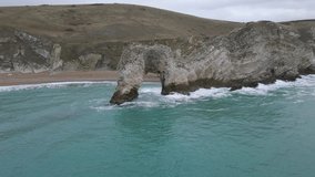 Areal view of the famous natural arch Durdle door in the jurassic coast, Dorset