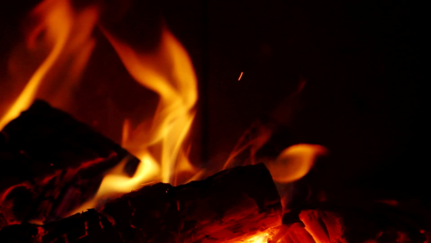 Detail of burning flames in fireplace in Slow Motion HD VIDEO. Natural fire filling full frame of screen. Quarter speed. Close-up. Royalty-Free Stock Footage #1063380667