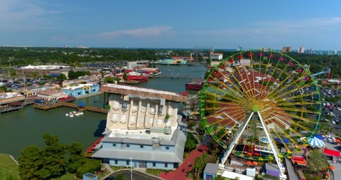 Myrtle Beach, South Carolina, United States - August 17, 2020: Myrtle Beach by Aerial Drone, Skywheel, Tourists, 4K