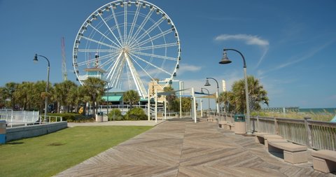Myrtle Beach, South Carolina, United States - August 17, 2020: Myrtle Beach Skywheel on the Boardwalk, 4K