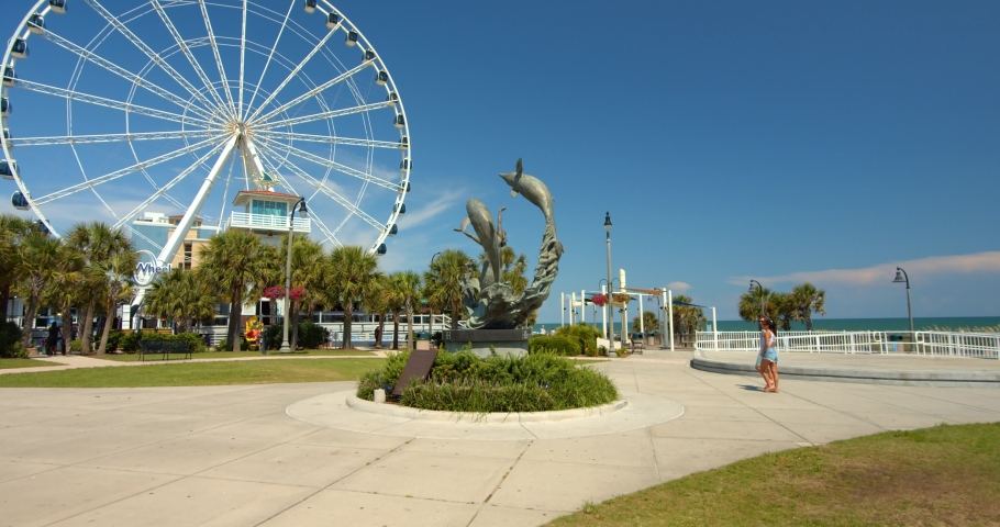 Myrtle Beach, South Carolina, United States - August 17, 2020: Dolphin Statue, Sculpture at Myrtle Beach, South Carolina