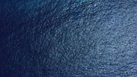 Top aerial view of blue calm ocean, Indonesia 