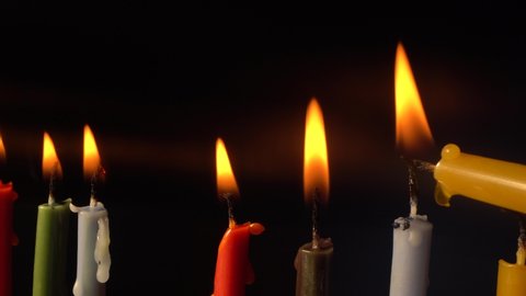 Lighting of menorah the eighth night of Hanukkah. Candle-lighting time, Fire close-up