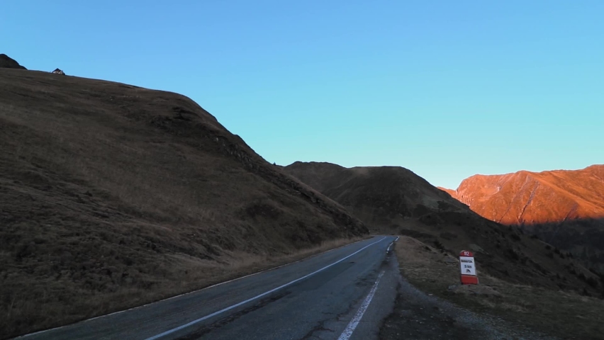 Breathtaking mountain landscape at high altitude with amazing road in autumn season
