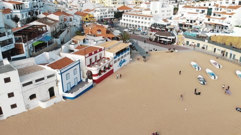 Carvoeiro , Portugal - 04 08 2019: Picturesque Carvoeiro beach and resort town, Algarve. Aerial panoramic view 