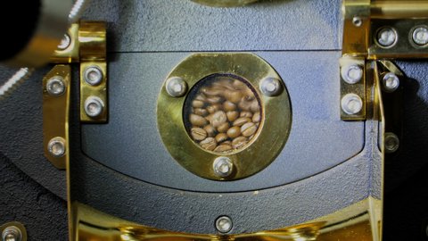 Roasted Coffee Beans In Modern Machine With Roaster 
