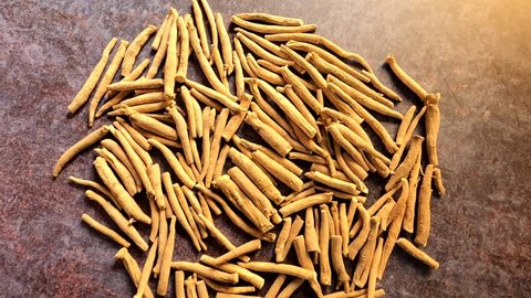 Whole raw dry Indian ginseng root