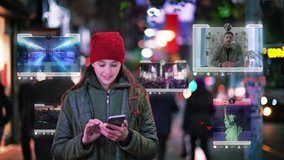 Young brunette caucasian woman walking and using a smartphone to check her social media account. Night time during winter season in a big city. - Powered by Shutterstock - Get 15% off with code: PIKWIZARD15