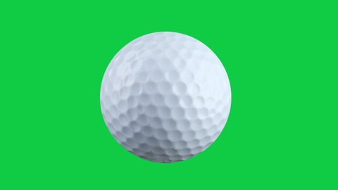 close-up of one golf ball rotating isolated on green screen background Chroma key
