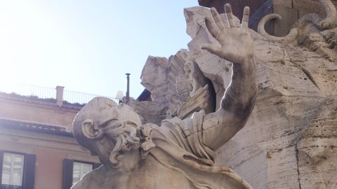 Scuplture detail of fountain of the Four Rivers in Piazza Navona. Rome Italy.