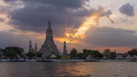 4K Time lapse of Wat Arun Temple at sunset. Wat Arun or known as Temple of dawn is a Buddhist temple located in Bangkok Yai district in Bangkok, Thailand