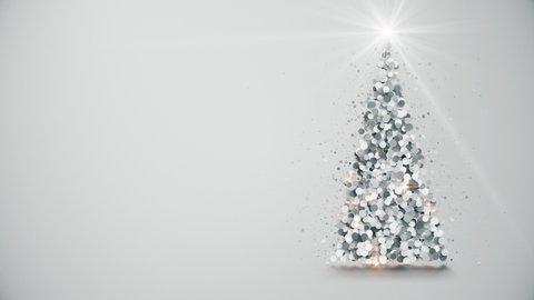 Happy New Year! Merry Christmas video greeting card. Silver Christmas tree from particulars with shining light on the top slowly rotating on gray background, 4K holiday animation