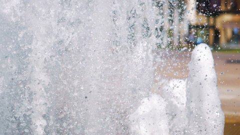 Fountain water splashing in the summer in slow motion 180fps
