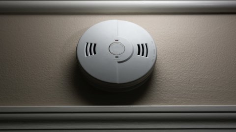 Smoke and fire trigger a home�s smoke alarm sending out a series of loud warning beeps.