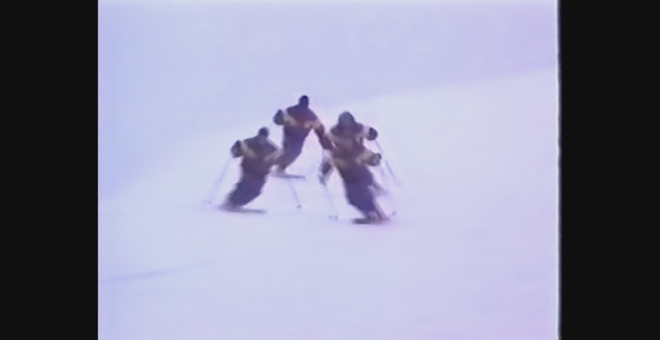 DOLOMITES, ITALY 3 JANUARY 1988: Acrobatic skiers in snow